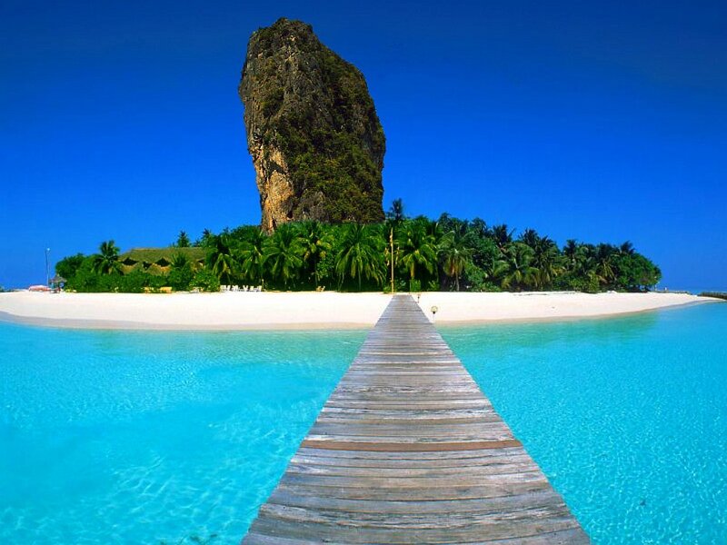 tropical island with wooden pier