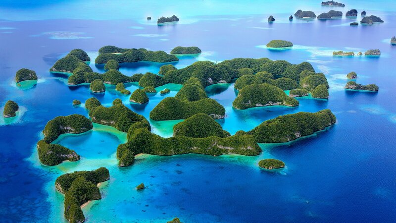 Tropical Islands in Blue Water — Serene, Afternoon, Photograph, Ocean