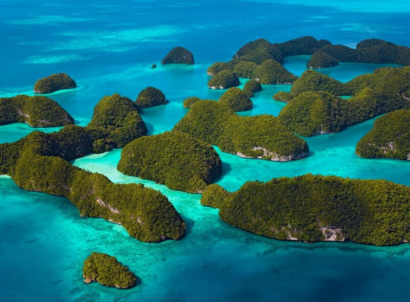 Tropical Islands in Turquoise Water — Blue, Serene, Afternoon, Photograph, Ocean, Coral Reefs, Green