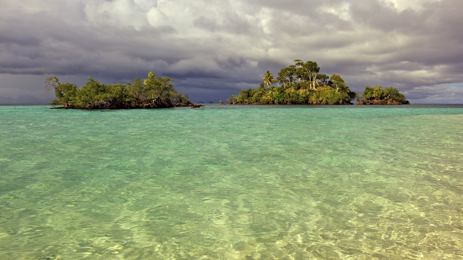 tropical islands under cloudy sky