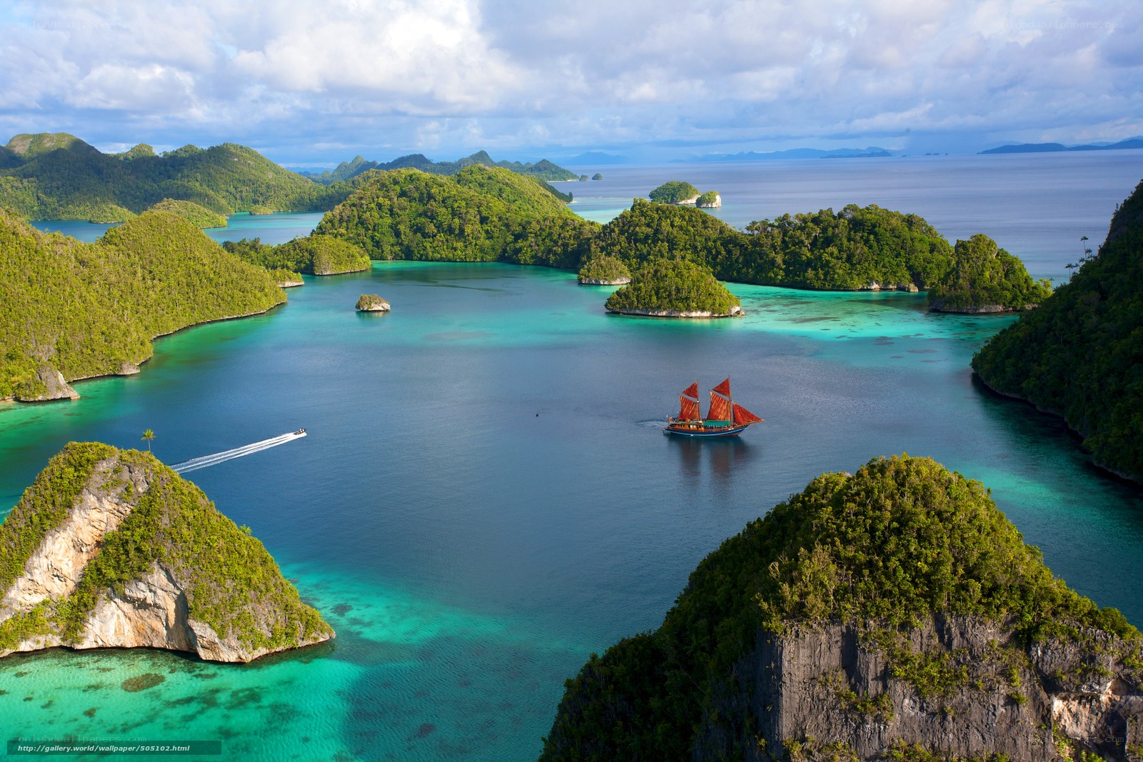 tropical islands with sailboat