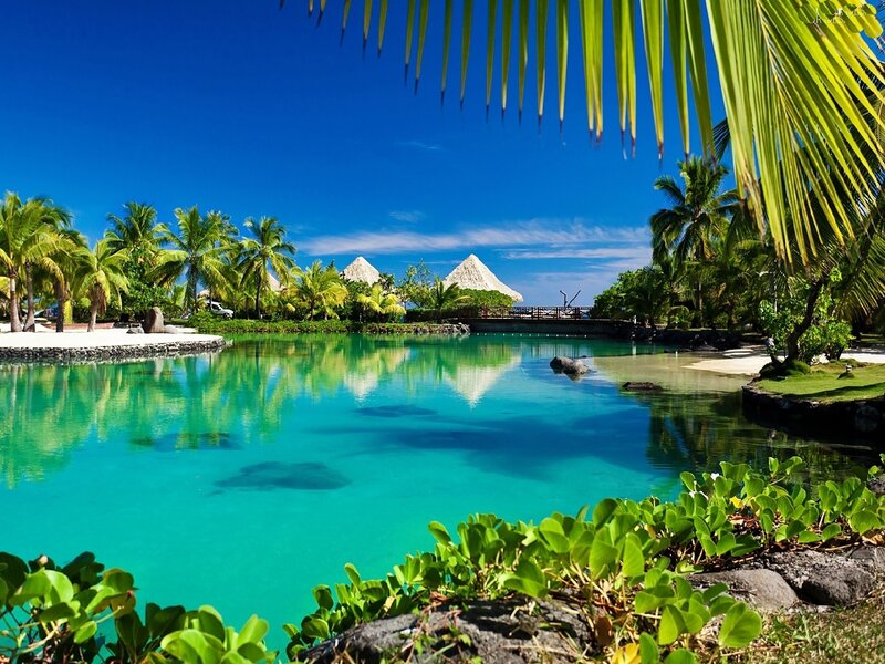 Tropical Lagoon with Huts