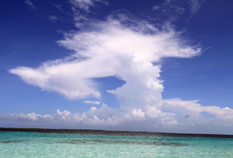 Tropical Ocean with Clouds — Blue