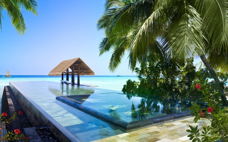 Tropical pool overlooking the ocean