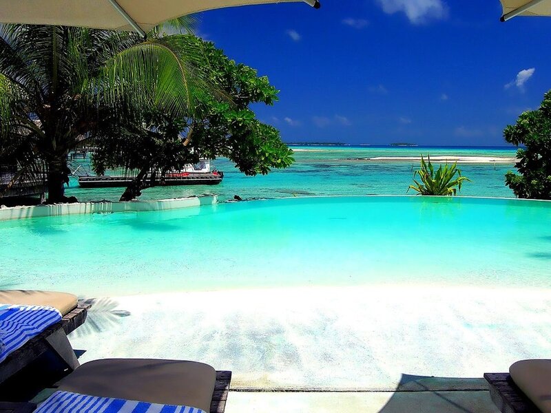 Tropical pool overlooking turquoise ocean