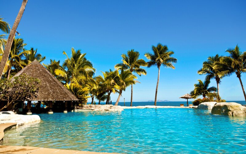tropical pool with ocean view