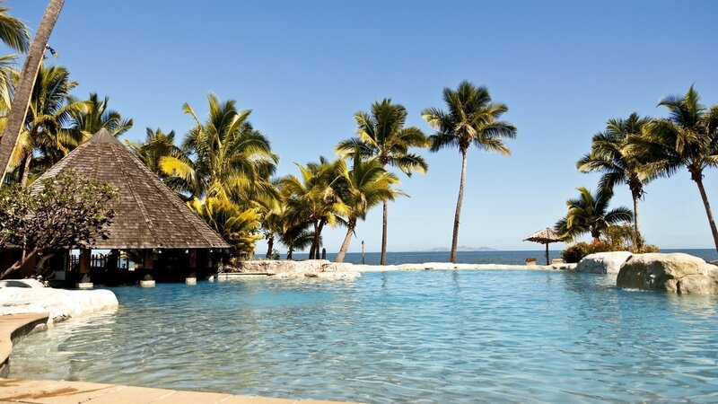 tropical pool with ocean view
