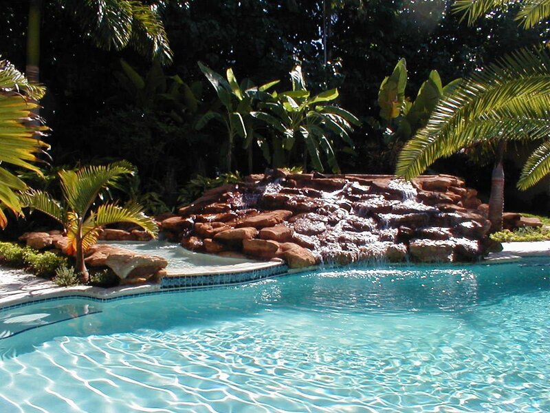 tropical pool with waterfall
