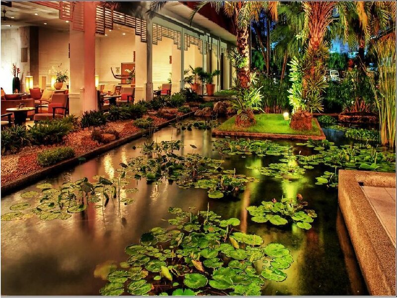tropical resort courtyard at night