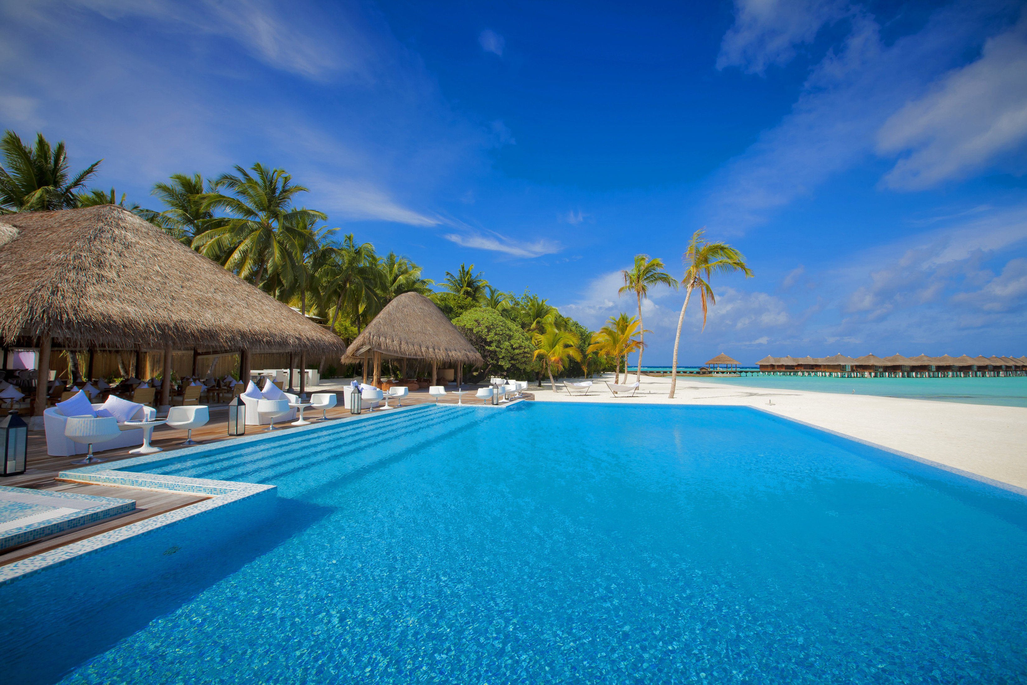 Tropical resort pool and beach