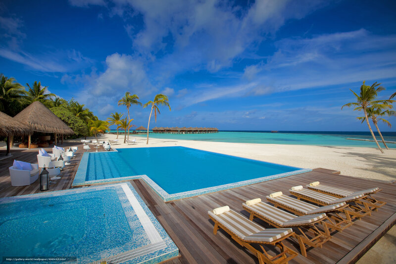 Tropical resort pool and beach