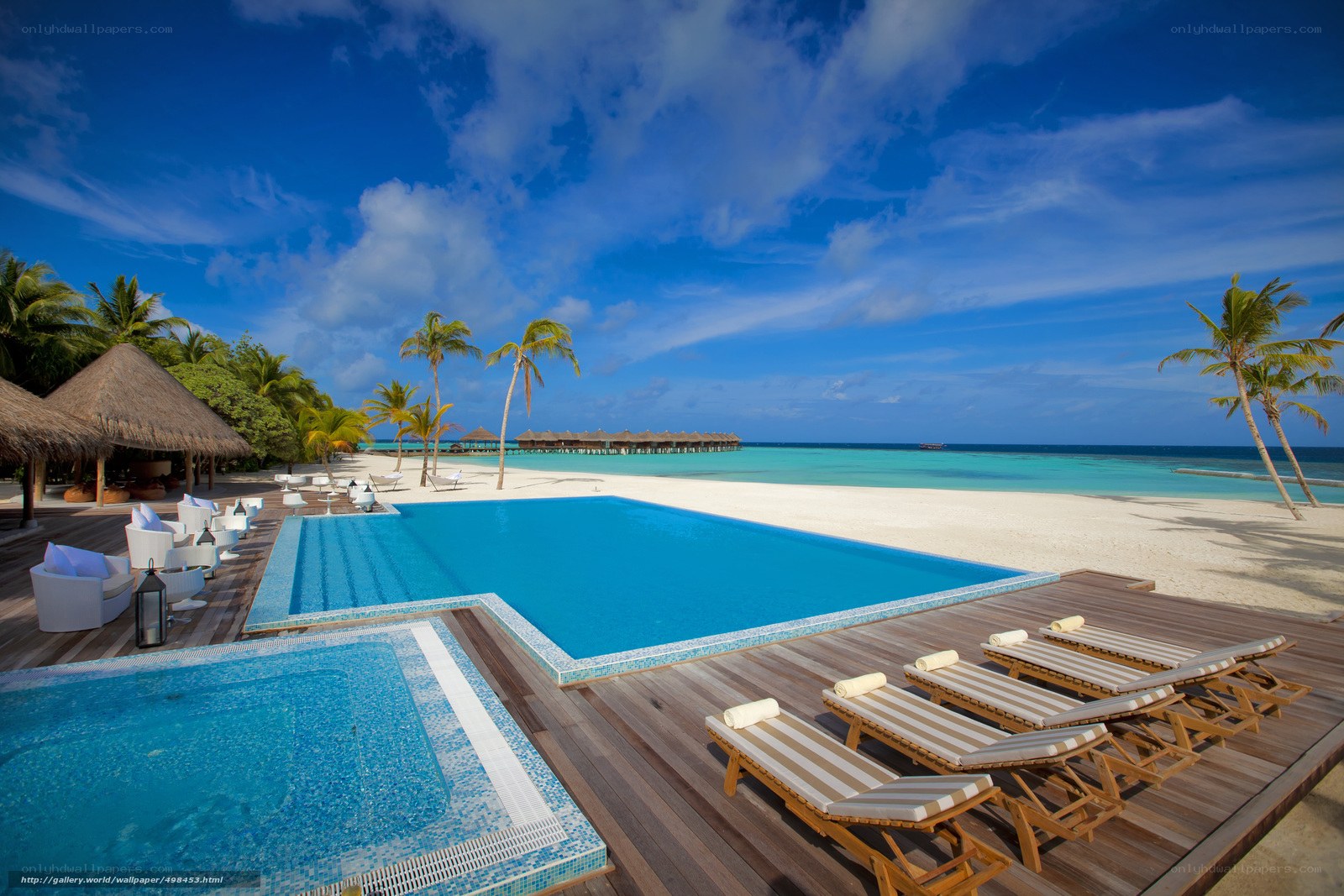 Tropical resort pool and beach