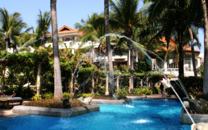 tropical resort pool with fountain
