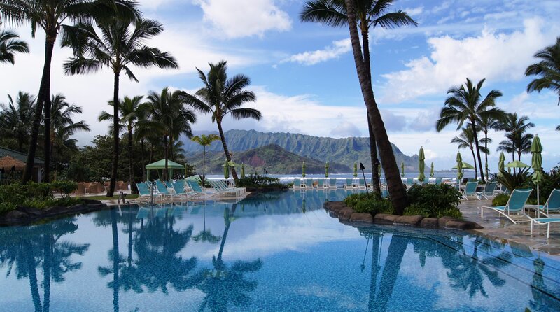 tropical resort pool with mountain view