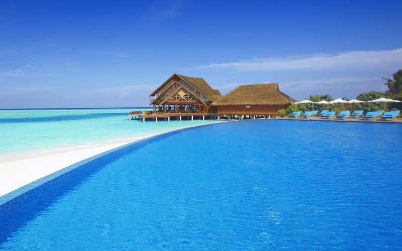 tropical resort with infinity pool