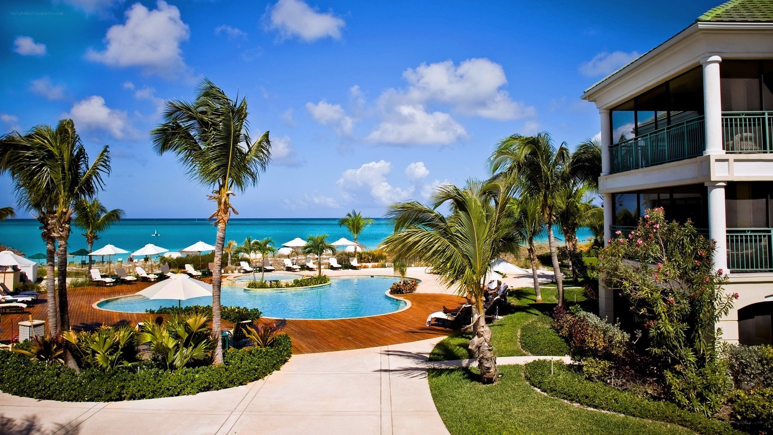 Tropical resort with pool and beach