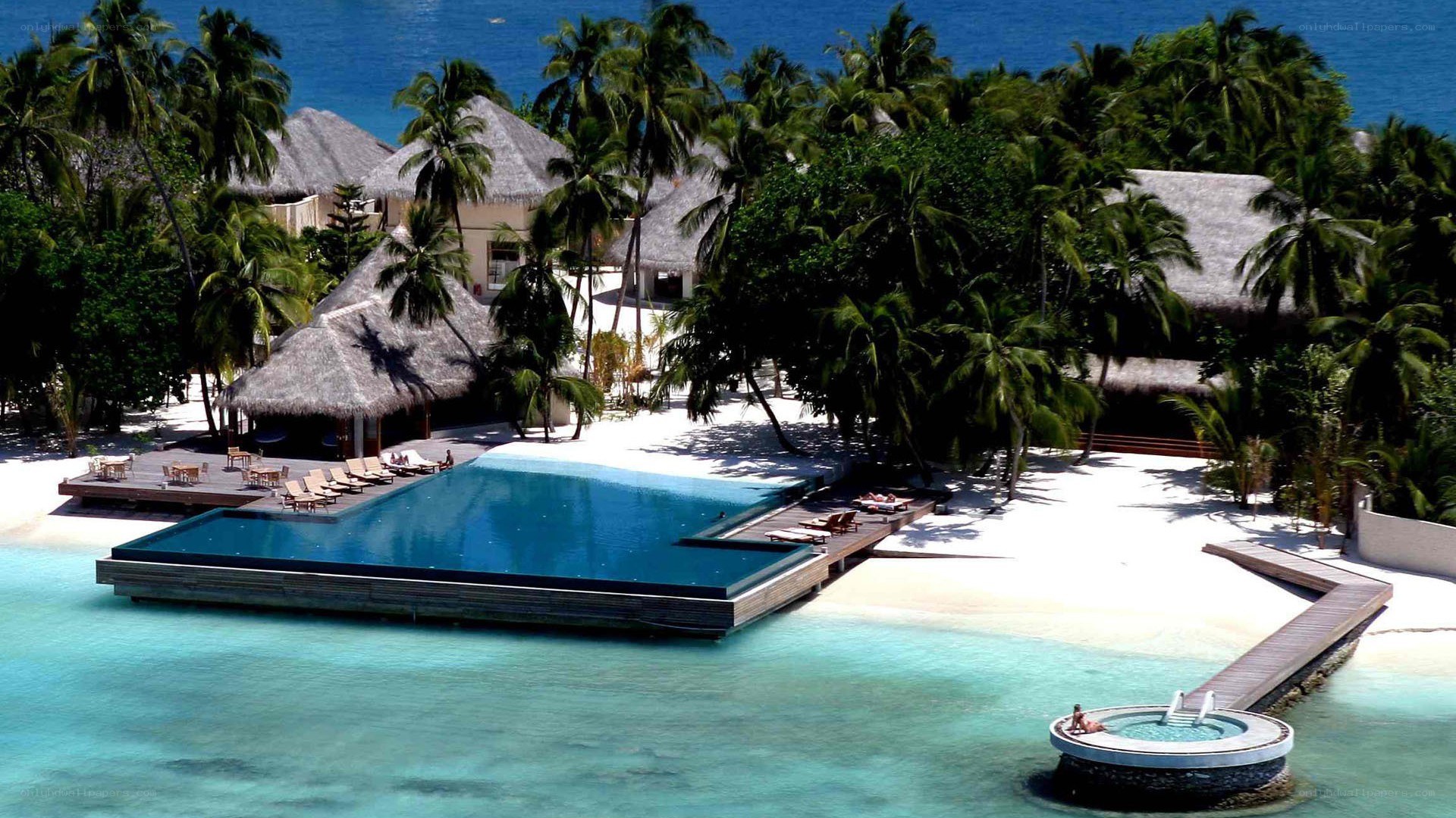 tropical resort with pool and beach