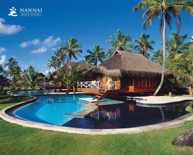 Tropical resort with pool and bungalows