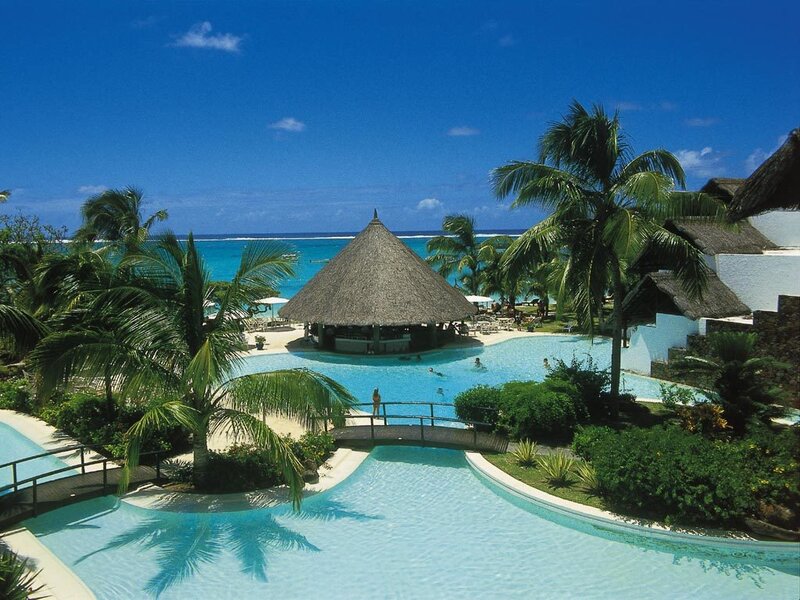 tropical resort with pool and ocean view
