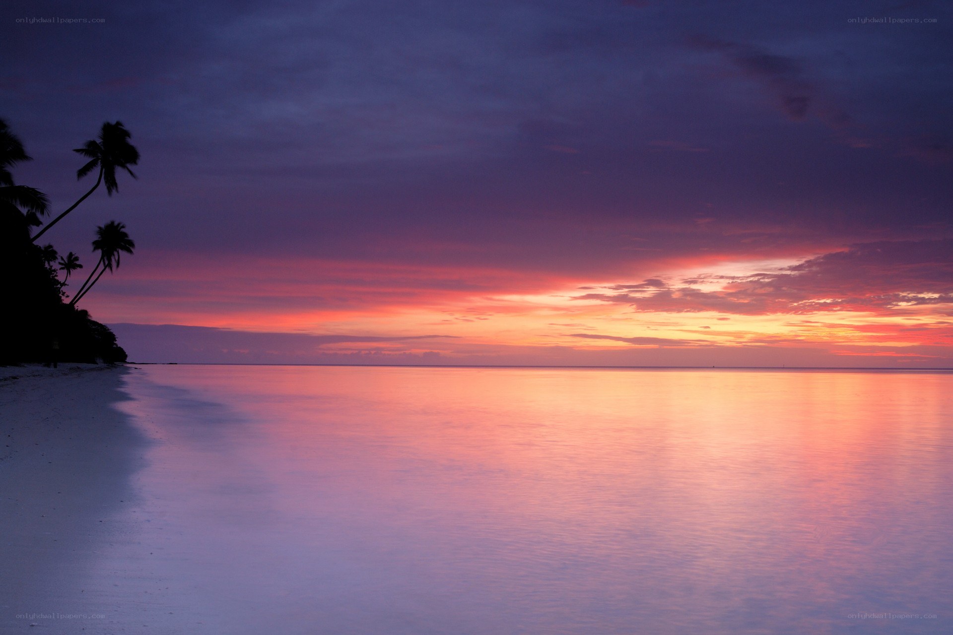 tropical sunset over calm sea