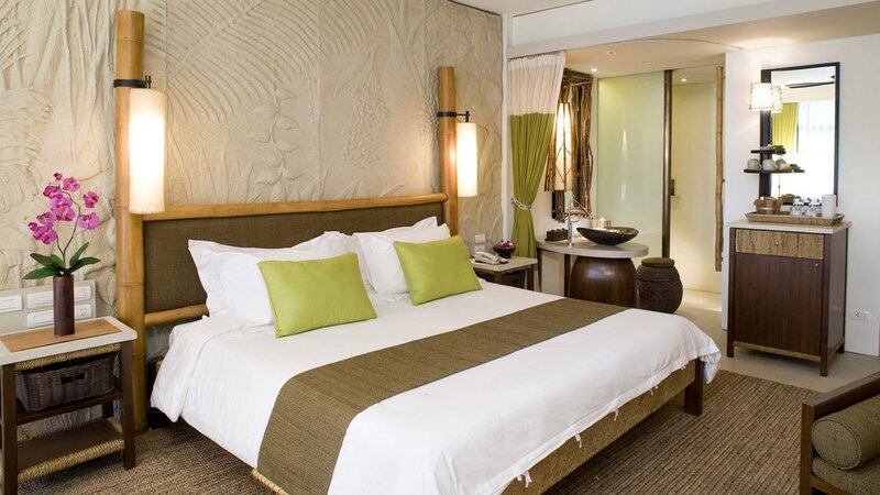 tropical-themed hotel bedroom