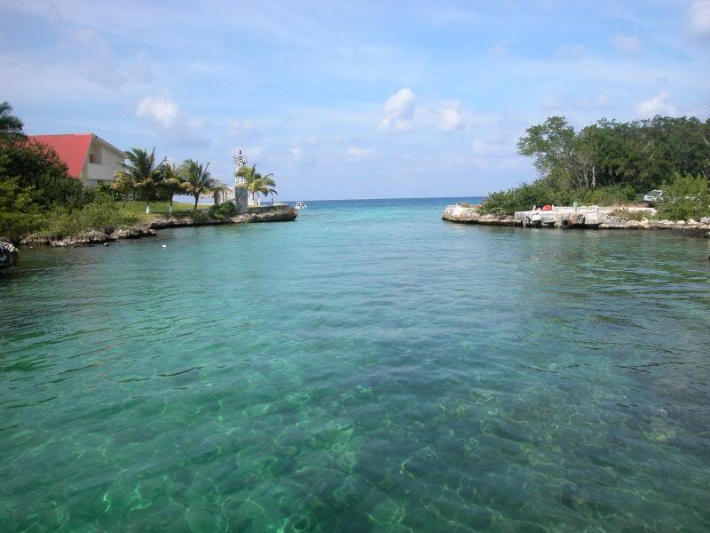 Tropical Waterway with Lighthouse