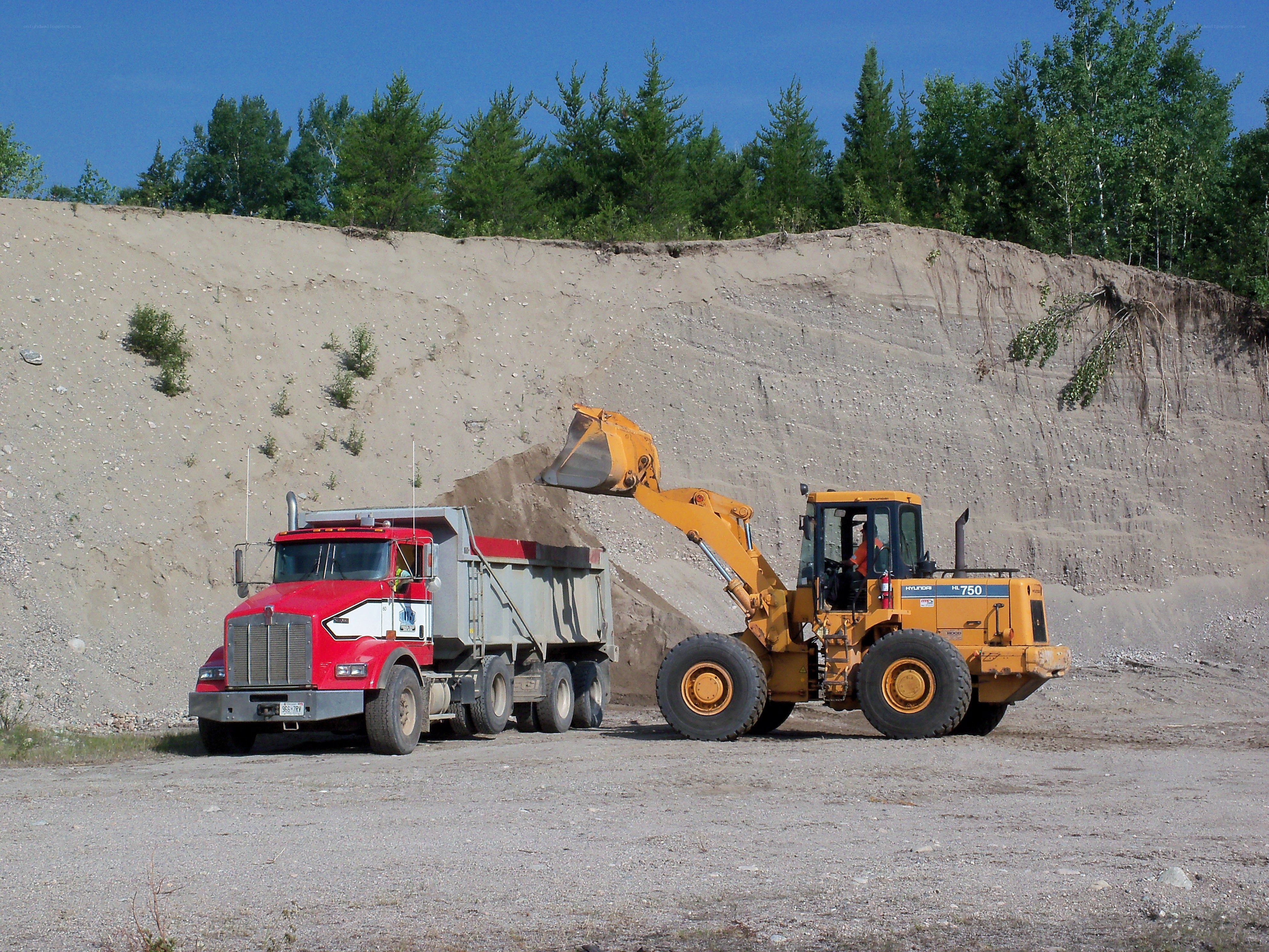 Truck and loader at quarry