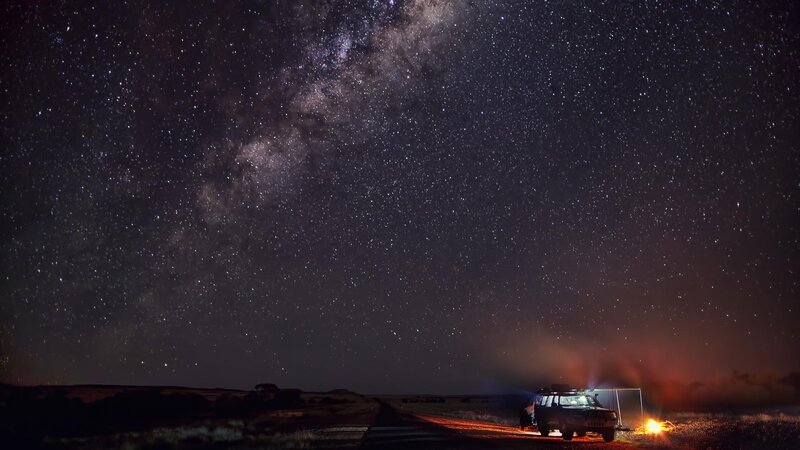 Truck at Campsite under Stars