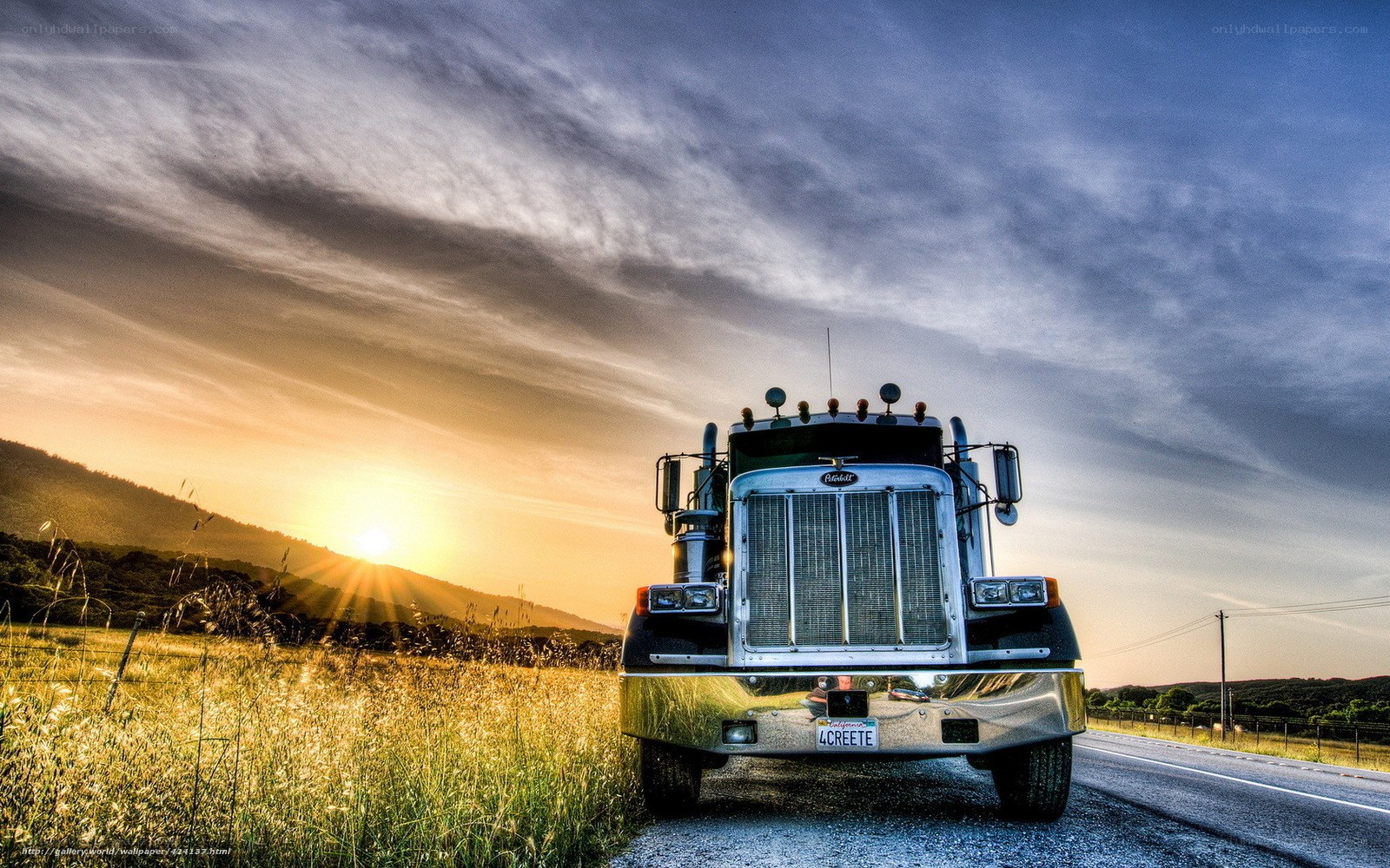 Truck at sunset on country road