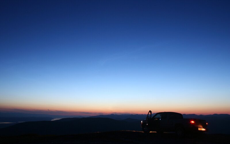 Truck at sunset on mountain