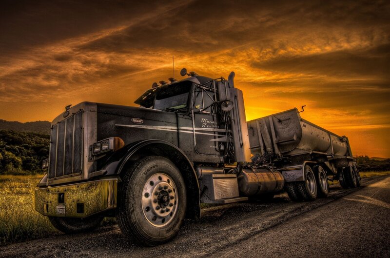 Truck at sunset on rural road