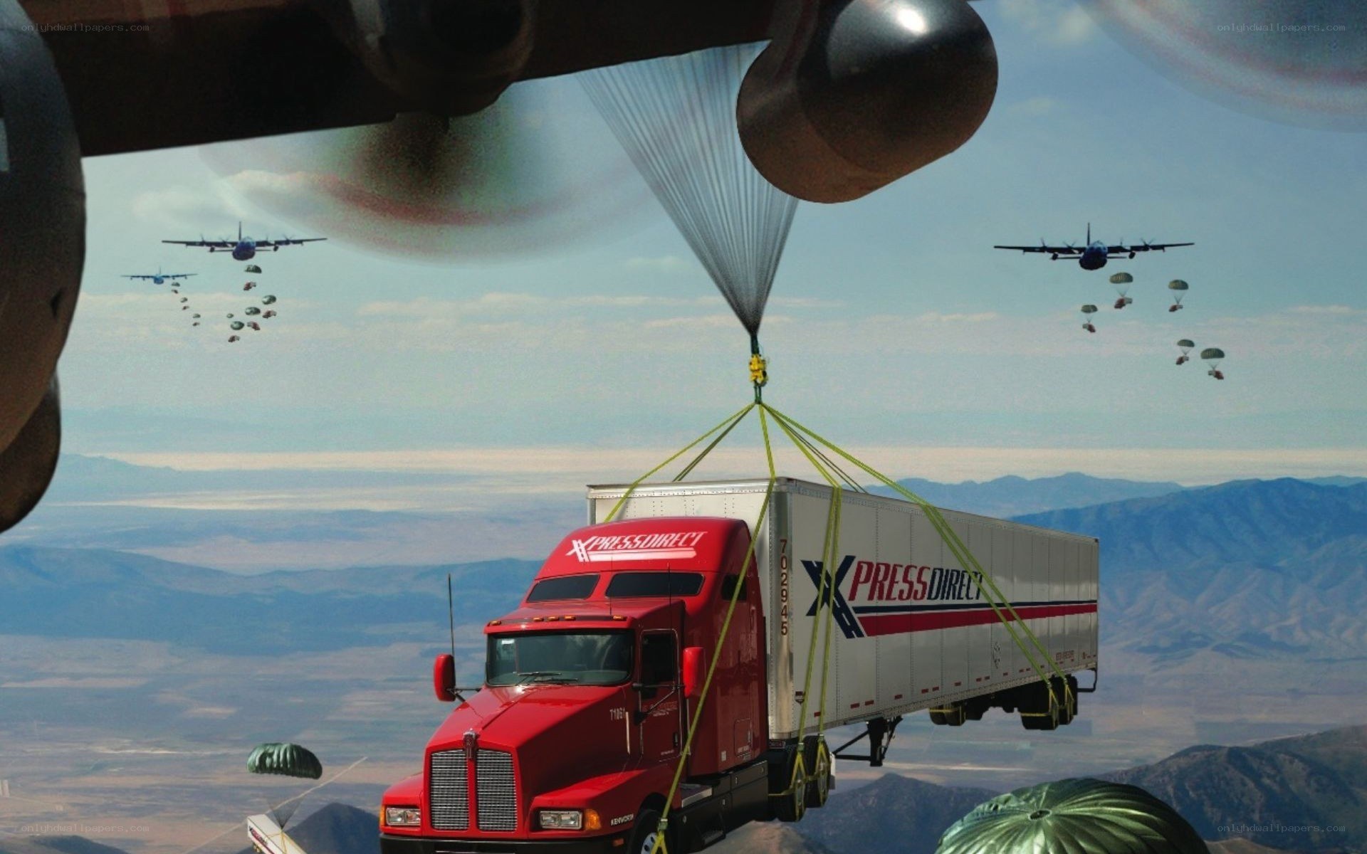 Truck being airlifted by planes