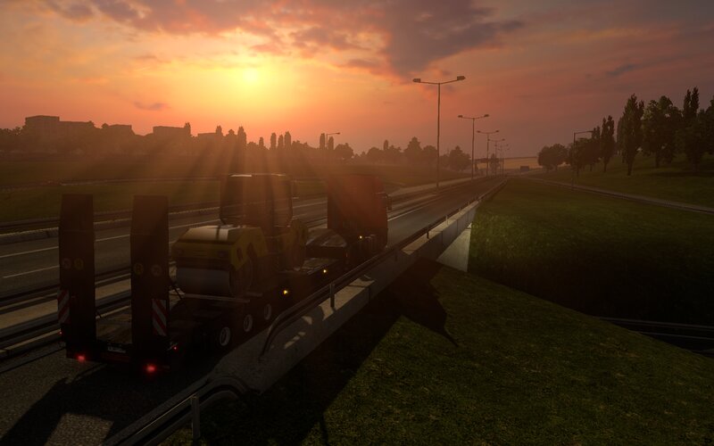 Truck Carrying Construction Equipment