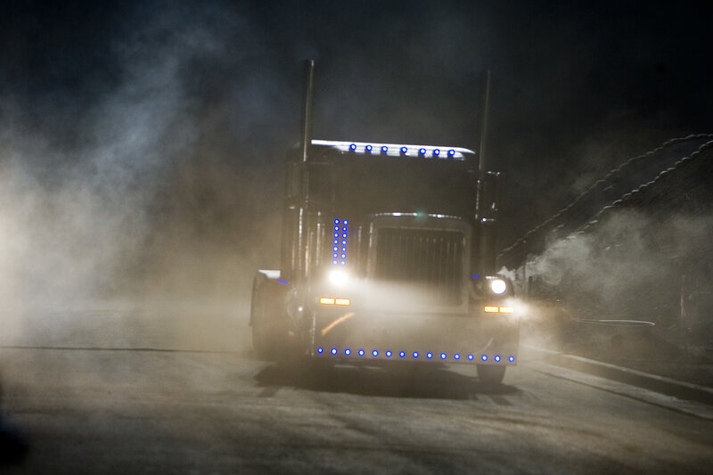 truck driving at night in fog