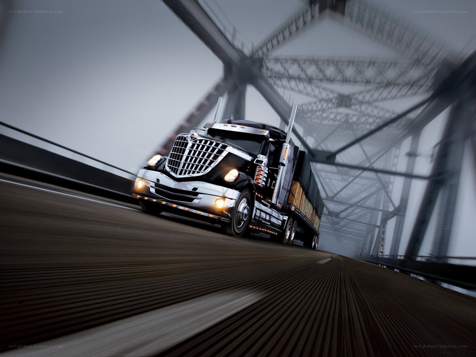truck driving on a bridge