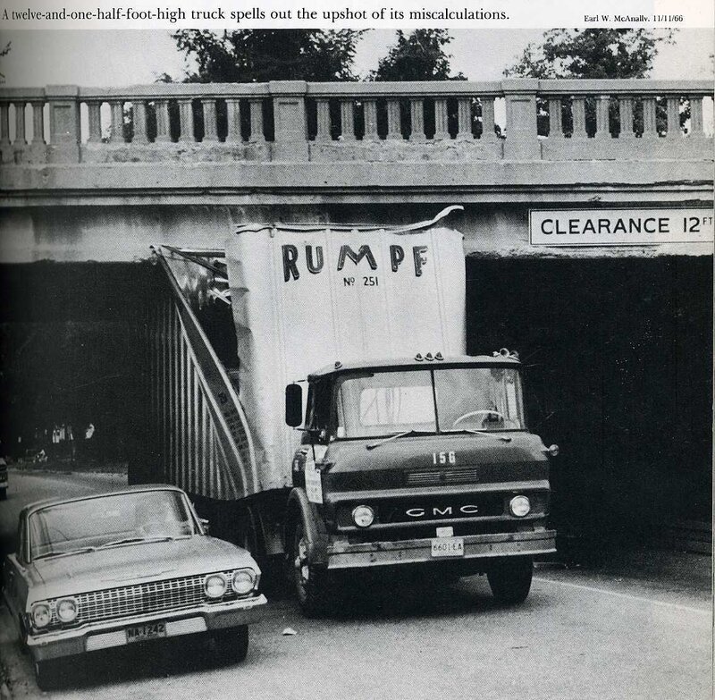Truck hits bridge underpass