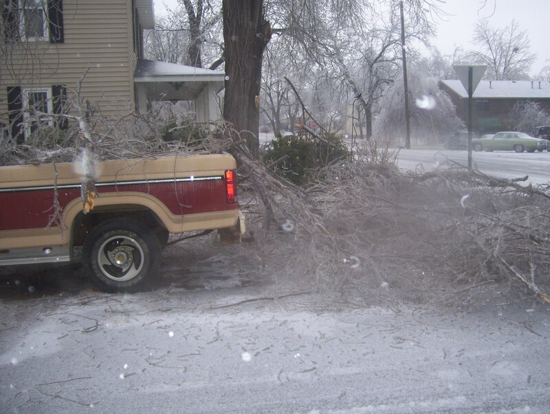 truck loaded with storm debris