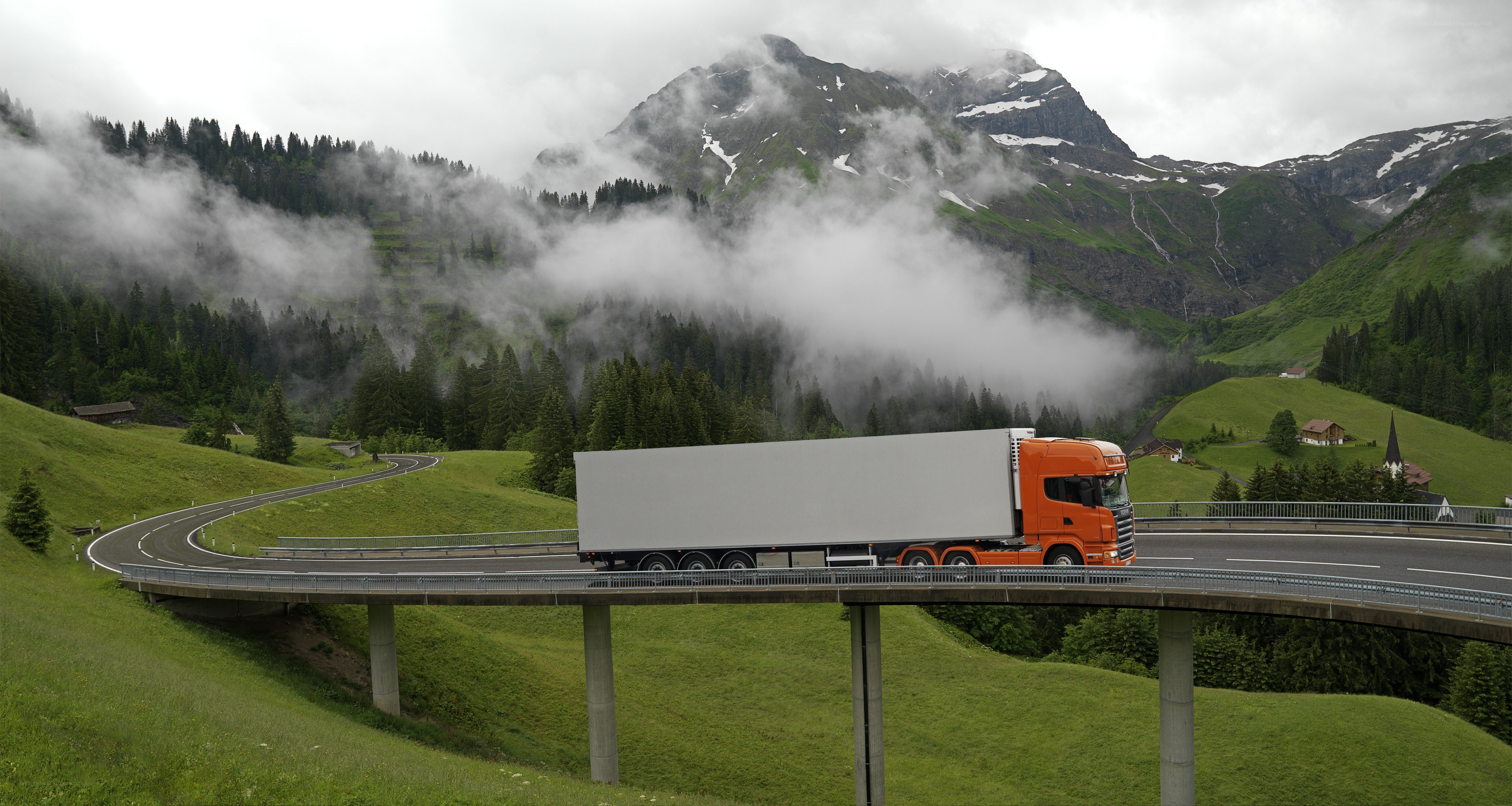 Truck on mountain bridge