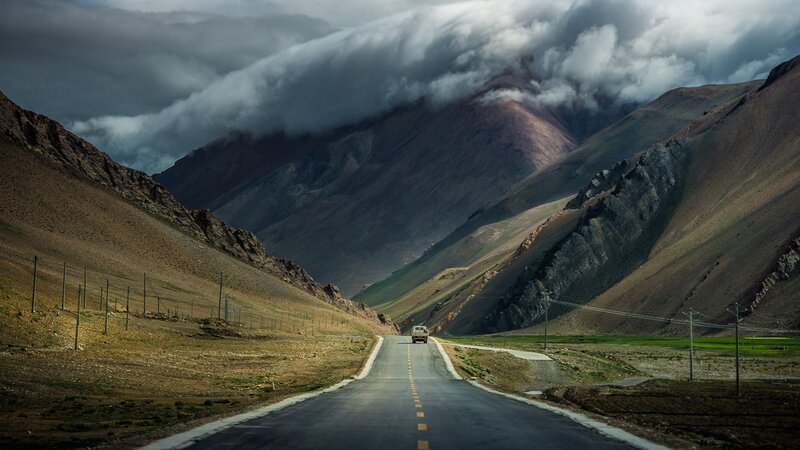 Truck on Mountain Road — Gray, Dramatic, Photograph, Clouds, Power Lines, Brown