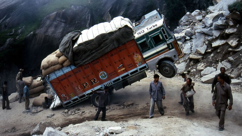 Truck on Mountain Road — Orange