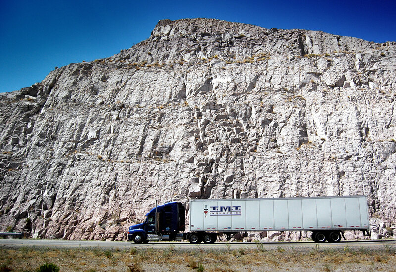 Truck on road near cliff