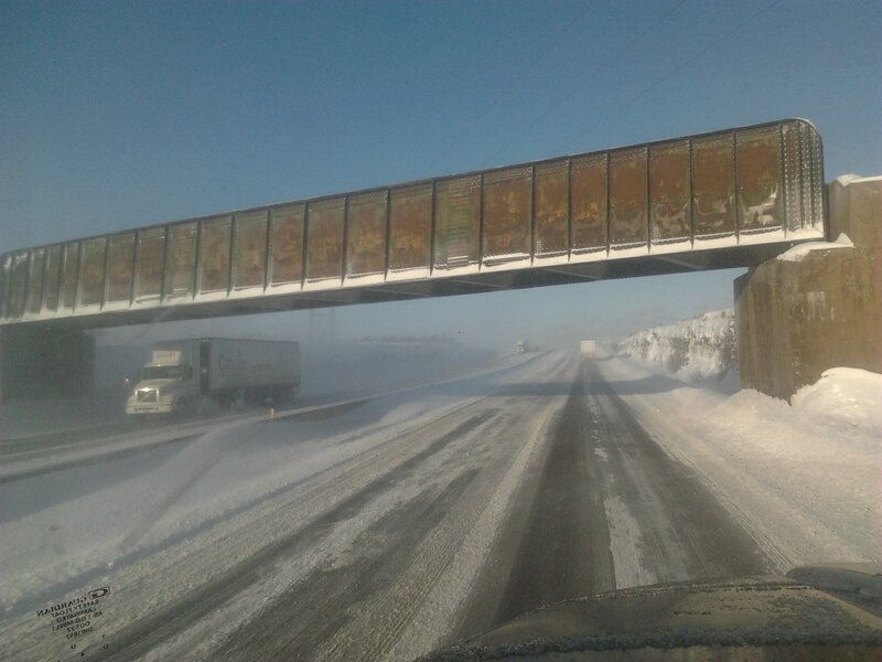 Truck on Snowy Highway — White