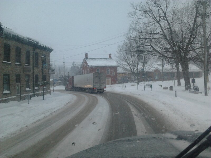 Truck on Snowy Road — White