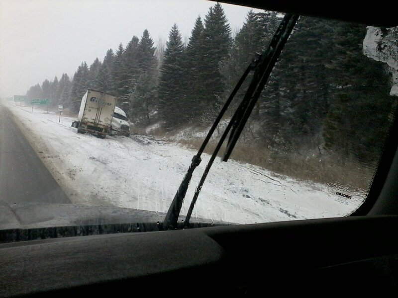 Truck on Snowy Shoulder