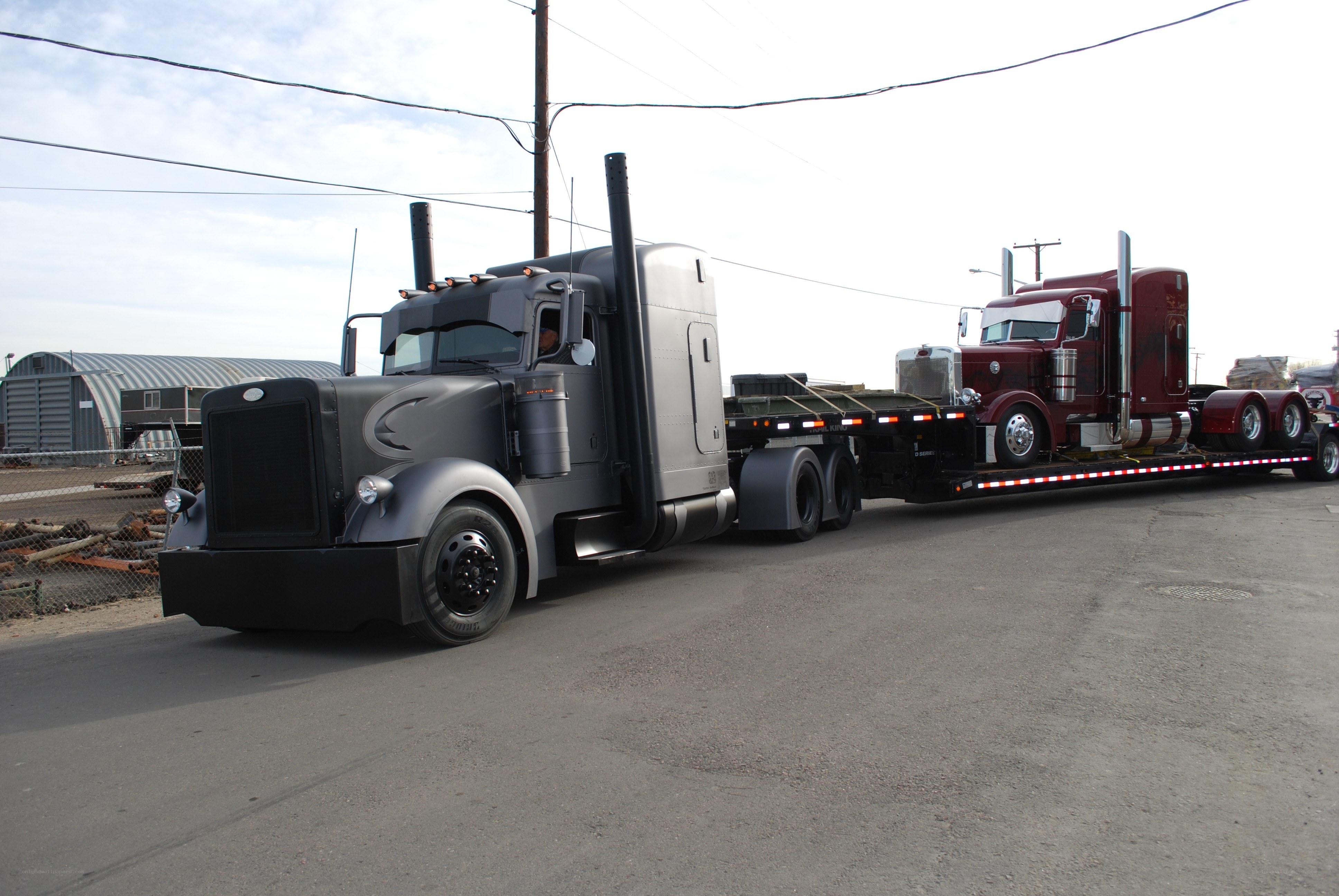 Truck transporting another truck