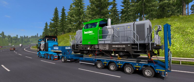 Truck Transporting Locomotive
