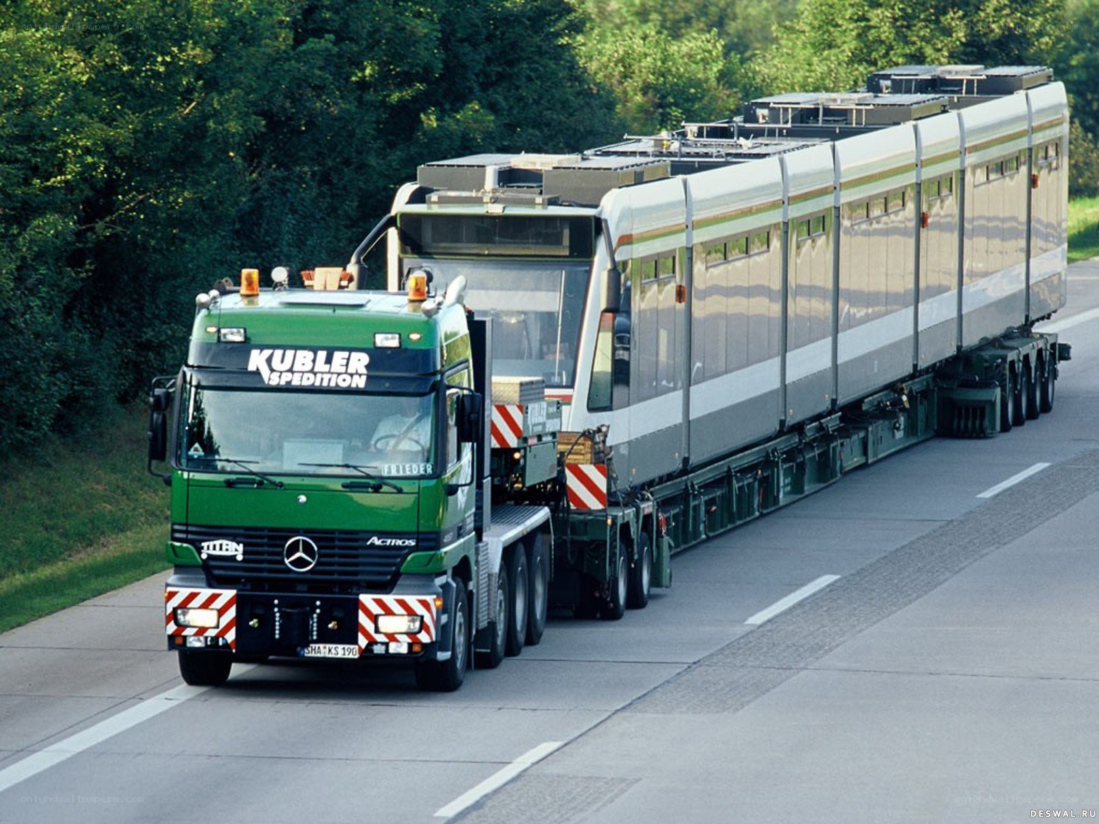 Truck transporting train car