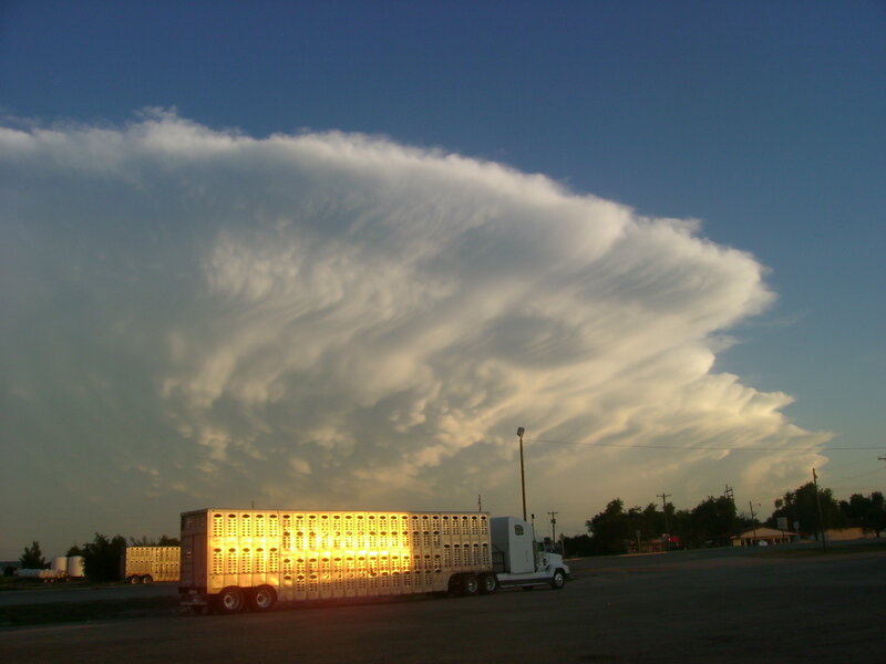 Truck under storm cloud