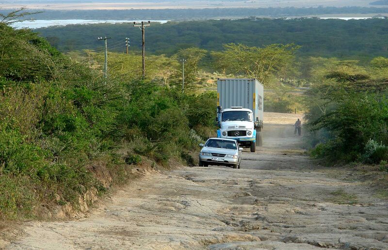 Trucks on Dirt Road