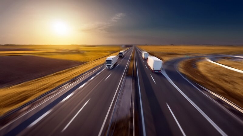 Trucks on Highway — Yellow